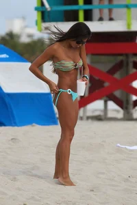 Karina Derizans in thong bikini on the beach