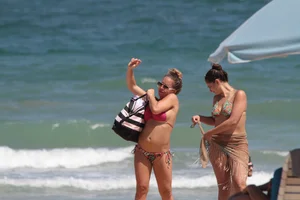 Big collection of various sexy girls on a beach in bikinis