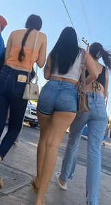 super sexy denim short shorts on this brunette with tremendous legs and big butt