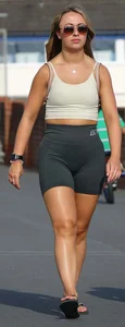 Blonde woman in lycra shorts - good front view, back view ruined by a bag