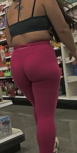 Fat ass shorty Asian with dark pink Alphalete at the