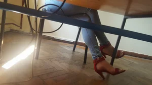 Gorgeous Candid Long Legs in Blue Jeans  And High Heeled Shoes Under Table Creepshot