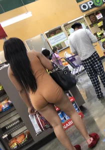 Latina with hard nipples and a big booty in tight spandex shorts outfit