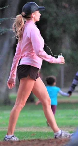Beautiful skinny girl out for a walk in little shorts