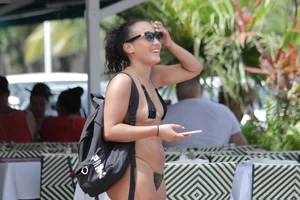 Florida Latina chick in micro thong bikini showing a ton of skin