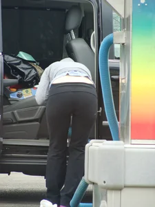 Girls cleaning their cars in jeans and pants