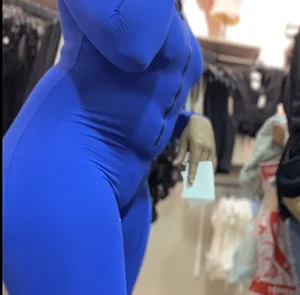 Thick mesmerizing ebony in a tight blue one piece