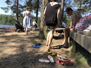Candid Girl Putting On Swimsuit and Undressing at the Forest Lake Beach Gallery