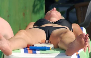 Girl Lying on Sunbed in Swimsuit Camel-toe Candid