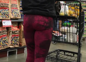 Milf grocery shopping in red leggings with a great ass