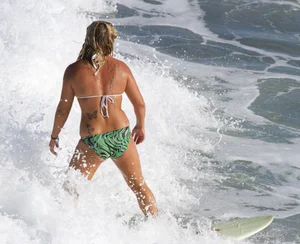 Candid surfer babes on the beach and in bikinis