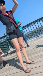 Very slim asian in black short legging. (VPL) OC