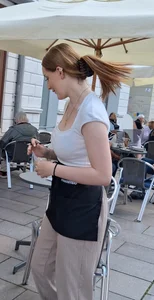 Pretty and slim waitress with big tits