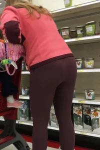 Target milf with a decent ass in maroon leggings
