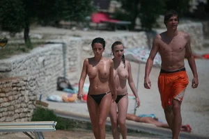 3 amazing topless girls on a nudist beach