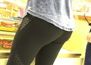 Nice round ass in leggings in line with no face