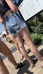 Blonde in cut offs with friends