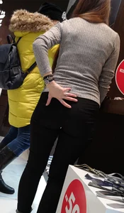 Big booty employee in tight black jeans with slight vpl
