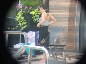 Hot girl at the pool in her bikini with big tits