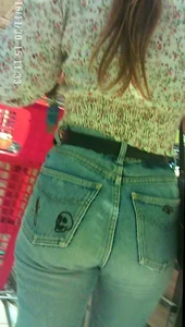 Sexy girl grocery shopping in jean with a nice ass