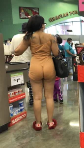 Latina with hard nipples and a big booty in tight spandex shorts outfit