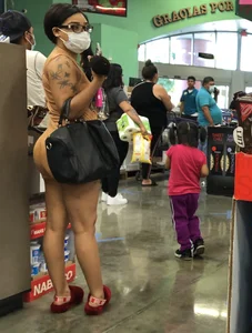 Latina with hard nipples and a big booty in tight spandex shorts outfit