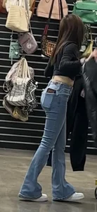 Petite Asian ho showing off tramp stamp & bubble butt