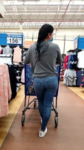 Latina with a bubble butt in tight jeans….