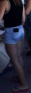 Sexy booty in denim shorts with a phone in back pocket, hot legs too