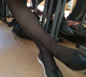 Skinny Legs under Desk in College Classroom Candid