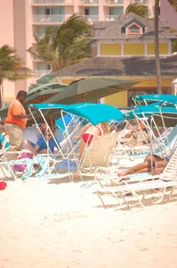 Bunch of sexy girls and milfs in bikinis at the beach