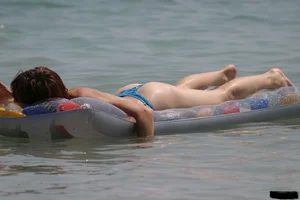Sexy candid topless and nude beach girls