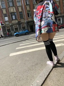 An Anime Fan Teen in a Short Skirt And Stockings Bending Over on the Crosswalk Street Creepshots
