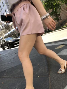 Cute candid girl in pink shorts street photos