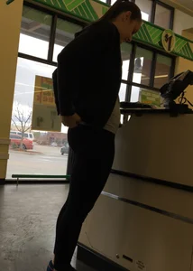Thick booty girl shopping at Dollar Tree in leggings