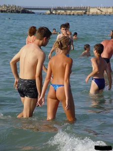Beach voyeur girls in bikinis, thongs and topless