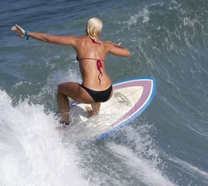 Candid surfer babes on the beach and in bikinis