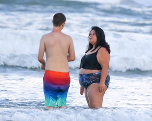 Extra thick girl at the beach in a bikini