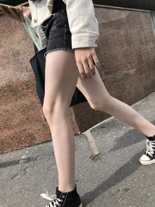 Cute candid teen with pale slim legs in shorts