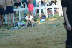Cute Hot Blonde Sitting on Sand on the Beach with Spread Legs Candid Photos