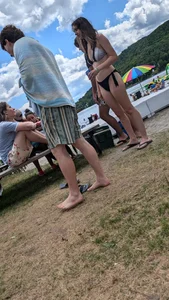 Tight girl brown hair with nice ass in black bikini. oc