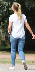Blonde chick walking with her boyfriend in tight jeans