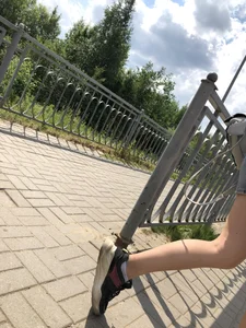 Cute Girl in Denim Shorts Walking Down a Railway Station Gallery