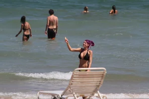 Big collection of various sexy girls on a beach in bikinis