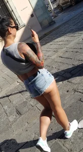 Nice legs and a little peach showing, shorts