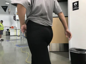 Sexy Amazon employee in leggings with a nice ass