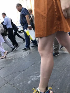 Cute Teen Girl in a Dress With Slim Legs Standing in the Subway Train, Then Crossing the Street Photo Gallery