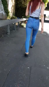 Redhead with a nice ass in tight jeans walking