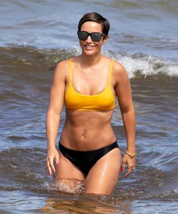 Frankie Bridge nip slips in a bikini on the beach
