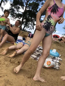 Girls in One-Piece Body Swimsuits Running Towards Water and Swimming - Beach Photo Gallery